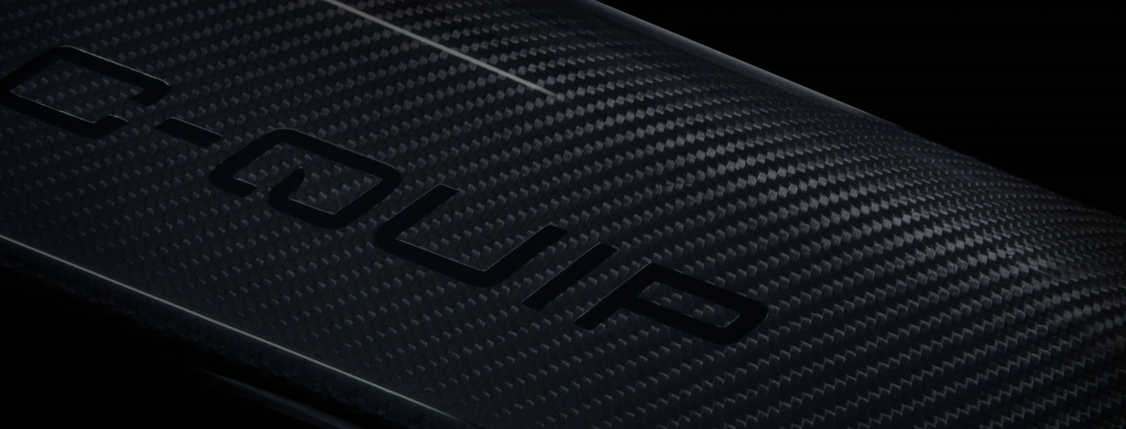 Carbon fibre weave detail with C-Quip branding