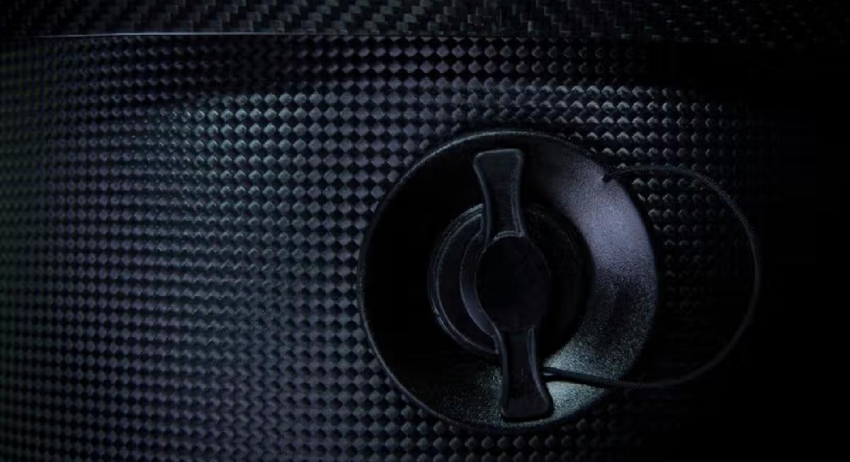 Detail of carbon fibre body with valve fitting