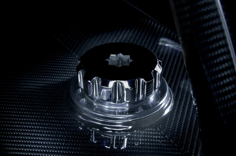 Polished stainless deck pin on carbon fibre